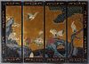 Japanese Black Lacquer Four Panel Table Screen, 20th c., with polychromed decoration of cranes in flight and in a garden, on a gilt background, with p