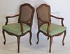 A Midcentury Pair Of Louis XV Style Arm Chairs.