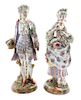 * A Pair of German Porcelain Figures Height 19 1/4 inches.