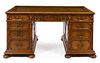 A William and Mary Style Walnut Pedestal Desk Height 30 1/2 x width 59 x depth 33 inches.