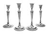 A Set of Four English Candlesticks, T.B. & S., Sheffield, each of baluster form with foliate decoration, weighted.