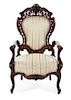A Rococo Revival Rosewood Armchair Height 44 1/2 inches.