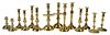 Seven Pairs of English Brass Candlesticks