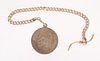 A 14K Gold Watch Chain With Russian Coin Fob