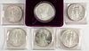 Six 1 ozt. fine silver American Eagle coins.