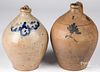 Two stoneware one gallon jugs, 19th c.