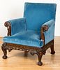 Chippendale style heavily carved wingchair.