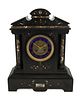 A Victorian slate and marble mantle clock