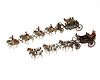 A group of Britains Ltd. horse drawn carriage lead toys