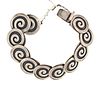 A Mexican sterling silver bracelet marked Los Castillo Taxco