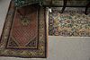 Two Oriental throw rugs / Kirman. 2' x 4' and 2'8" x 4'.