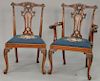 Set of eight mahogany dining chairs with Louis XV style legs and needlepoint seats.