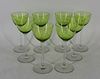 8 Baccarat Clear to Lemon Glasses.