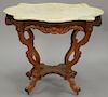 Victorian shaped marble top table. ht. 30 in.; top: 25" x 35"
