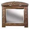 An Art Nouveau copper framed overmantle mirror, the repoussé frame with rounded top and embossed sty