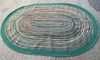 L.L. Bean, Maine, USA, a braided New England pattern rug 400 x 244cm (156 x 95in) <br>
