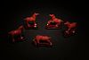 A Group of Five Cinnabar Lacquer Horse Figurines