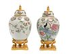 A pair of Chinoiserie lidded porcelain ginger jars