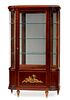 A French Empire-style vitrine cabinet