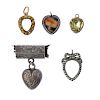 A selection of five mid to late Victorian heart-shape memorial pendants. To include a moss agate hea