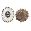 Two late Victorian brooches. The first of oval-outline with scalloped surround to the white chalcedo
