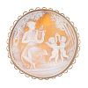 A 9ct gold cameo brooch. Of circular outline, the cameo depicting a winged lady playing a lyre for t