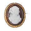 A shell cameo brooch. The shell carving possibly depicting Mary Queen of Scots, to the cannetille an