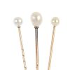 A selection of three cultured pearl stickpins. Each set with a single spherical or semi-baroque cult