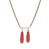 A coral necklace. Designed as a rope chain with four spherical coral beads at irregular intervals, t