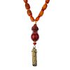 A natural amber necklace. Designed as thirty-eight natural amber beads or barrel and bouton shapes a