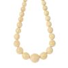 Two early 20th century ivory bead necklaces. Each designed as a series of graduated ivory beads meas