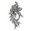 Twenty-three items of marcasite jewellery. To include a brooch designed as a floral spray set with m