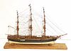 C1930 WOODEN 3 MASTED SHIP MODEL 15 1/2"H X 22 1/2"L X 3"W IN LUCITE CASE