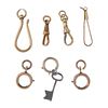 Seven 9ct gold clasps. To include three spring-ring clasps, a hook clasp two lobster clasps and a pi