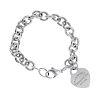 TIFFANY & CO. - a bracelet. The belcher-link chain suspending a heart-shape charm reading 'Please re