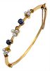 15 Karat Gold Bangle Bracelet, set with blue stones and pearls in a fitted box, Connard Son Ltd., 9.9 grams.