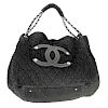 CHANEL - a Quilted CC Tote. Featuring a black wrinkled nylon exterior with quilted diamond pattern,