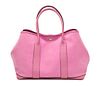 A Hermes Sakura Pink Canvas and Leather Garden Party GM Tote Bag, 14" x 10" x 6.5".