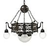 An Arts and Crafts Hammered Copper and Iron Chandelier, Diameter 34 inches.