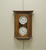 Howard Miller Oak Calendar Clock, Model 612-545.