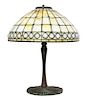 * A Tiffany Studios Favrile Glass and Bronze Geometric Lamp, Height overall 19 1/4 x diameter of shade 16 inches.