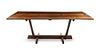 * A Mira Nakashima Walnut and Rosewood Conoid Dining Table, Height 28 3/4 x width 83 3/4 x depth 42 3/4 inches.