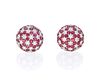 A pair of ruby and diamond dome earrings