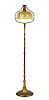 * A Tiffany Studios Gold Favrile Glass and Dore Bronze Floor Lamp, Height overall 56 1/2 x diameter of shade 10 1/4 inches.