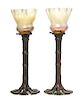 A Pair of Tiffany Studios Bronze Candlesticks, Height 14 5/8 inches.