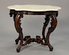 Shaped Victorian marble top table. ht. 28 in.; top: 25" x 35"