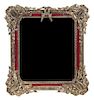 A Giltwood and Lacquered Mirror, designed by Salvadore Dali, Height 35 x width 31 inches.