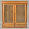 Victorian oak two door bookcase with two drawer base. ht. 65 1/2 in.; wd. 62 1/2 in.