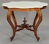 Shaped Victorian marble top center table. ht. 28 in.; top: 24" x 35"