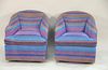 Vintage swivel club chairs with blue striped fabric.